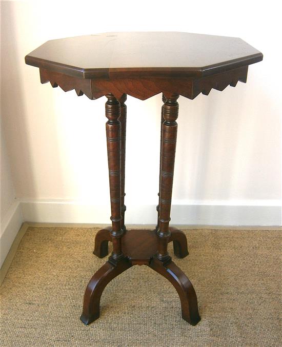 A Victorian mahogany octagonal table and a Liberty ebonised Hampden table Larger H.70cm